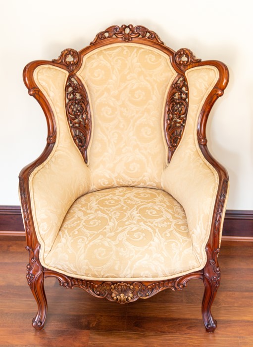 A pair of recent wing back armchairs, damask upholstery, carved lovebirds to the top rails (2) Note: - Image 3 of 4