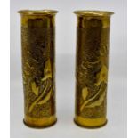 **WITHDRAWN** A pair of matching Trench Art 'Verdun' shells in brass. Height approx 27.5cm.