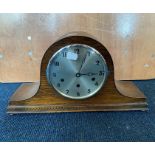 An early 20th century oak cased continental 8 day mantle clock