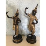 A pair of 20th Century Thai gilt bronze dancing figures (2)