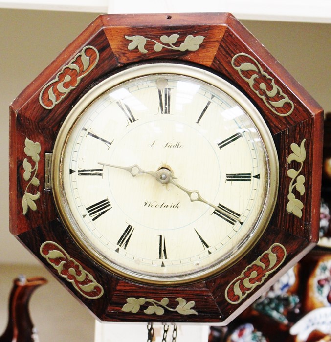 A mid 19th Century octagonal rosewood and brass inlaid postman alarm wall clock, by L Siedle,