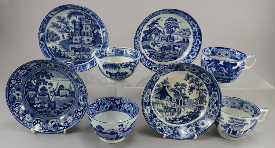 A group of early nineteenth century blue and white transfer-printed rural tea wares, c. 1820-30.