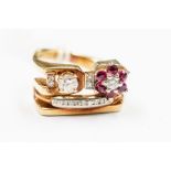 A diamond and ruby fancy cluster 14ct gold ring, comprising one side set with a brilliant cut claw