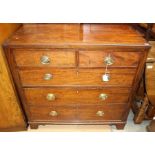 A George III mahogany chest of drawers, comprising two short over three long graduated drawers, with