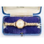 An early 20th Century Helvetia 9ct gold ladies cocktail watch, octagonal case with round target