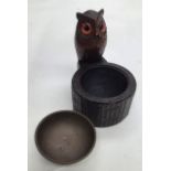 A Black Forest figural owl ash bowl, probably early 20th Century, hand carved, the owl figure