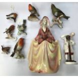 A group of decorative ceramics to include: A Royal Doulton figure The Wigmaker of Williamsburg, a