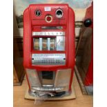 A Mills HI-Top Slot Machine, one arm bandit, 1d play, with hood and back door, working order,