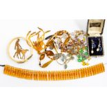 A collection of mid 20th Century jewellery to include an Art Deco double headed snake slave