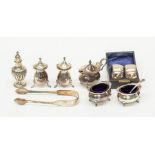 A Georgian style silver matched condiment set, wavy rim comprising mustard pot, pair of salts and