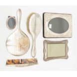 A collection of silver to include: early 20th Century silver mounted dressing table set (Hair brush,
