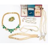 A collection of costume jewellery to include a Nina Ricci, Art Deco design gilt metal set with white