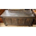 An early 18th Century joined oak chest, the plank lid enclosing storage section below, having four