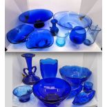 Quantity of blue glass including large fruit bowls, pair of dishes, vase, jugs and glasses (16