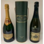 Three bottles of Champagne, comprising: Bollinger 1973 (cased); Moet & Chandon Vintage 1995 (cased);