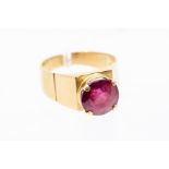 A ruby and 18ct gold dress ring, the round cut ruby approx 10mm x 10.3mm x 7.3mm, claw set to an