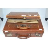 Two leather cases containing early 18th Century indentures and 19th Century earlists 1719