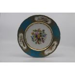 A pair of Sevres-style dessert plates, 19th Century, of slightly lobed form, finely painted with