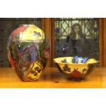 A Dartington Pottery vase, of ovoid form and decorated with brightly coloured abstract panels of