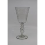 A Continental soda glass engraved goblet, early 19th Century, the funnel bowl engraved with