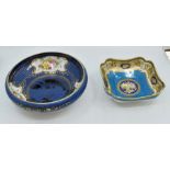A collection of Noritake, including a hand painted blue fruit bowl with panels of still life