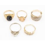 A collection of rings to include: 9ct gold set Cameo ring, 10mm long (af); 9ct gold onyx set ring;