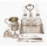 A collection of silver and silver plated items to include a cruet set, a miniature chamber stick