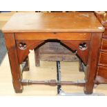 A 19th Century Gothic Revival wood grained alter table, on a pine ground, carved trefoil