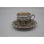 A French porcelain breakfast cup and saucer, late 19th/early 20th Century, of lobed ogee shape and