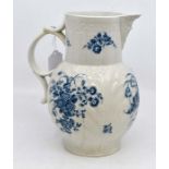 A Worcester cabbage leaf jug, circa 1770-90, with mask spout and double-scroll handle, the outside