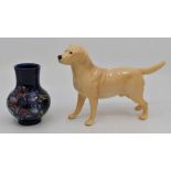 A mid 20th Century Moorcroft vase, small, blue ground, along with a Beswick Labrador dog CR; No