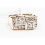 A diamond and 18ct gold ring, geometric form with two square raised settings set with an old cut
