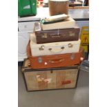 A collection of vintage suitcases, hat box and mixed fur items