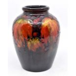 A Moorcroft Flambe 'Leaf and Berry' pattern ovoid shaped vase, early 20th Century, tube lined