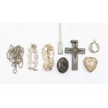 A collection of silver jewellery to include a silver chain, silver ingot and chain, silver hair