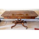 A Regency rosewood and brass inlaid sofa table,