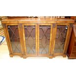 A George III style mahogany breakfront bookcase, of recent manufacture, fitted with four glazed