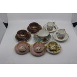 A group of Continental porcelain cabinet cups and saucers, late 19th/20th Century, including two