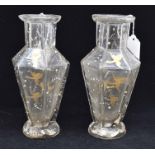 A pair of Bohemain glass carafes, early 20th Century, of hexagonal faceted baluster form and