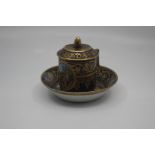 A Vienna porcelain chocolate cup, cover and stand, of cylindrical shape with bracket handle, painted