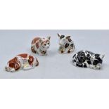 A collection of four Royal Crown Derby small paperweights to include; Misty, puppy (spaniel),