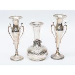 A pair of Edwardian Art Nouveau style silver vases, elongated bodies with twin handles, by Henry