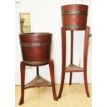 Two early 20th Century standing oak and brass bound planters, each raised on curved supports, joined