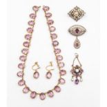 A collection of antique paste set jewellery to include a silver gilt brooch with dropper set with