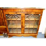 A 19th Century mahogany two door glazed bookcase, Gothic glazing bars, possibly the upper section of