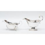 A George VI silver sauce boat, scroll handle, pedestal and stepped foot, by James Dixon, Sheffield
