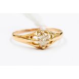 An 18ct gold diamond ring, comprising a cushion cut old cut diamond, weighing approx. 0.40ct, claw