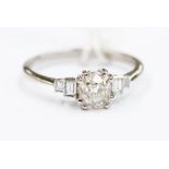 A diamond and platinum ring, the claw set old cut diamond weighing approx. 0.88ct, cushion shaped,