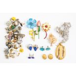 A Trifari gilt metal pendant and earrings suite, along with a quantity of costume jewellery and