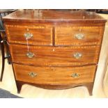 An early Victorian mahogany and satinwood cross-banded inlaid bow fronted chest of drawers,